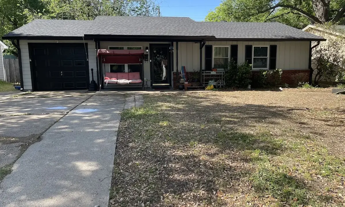 Asphalt Shingle Roof Repair crew at work on a residential roof in Pinehurst